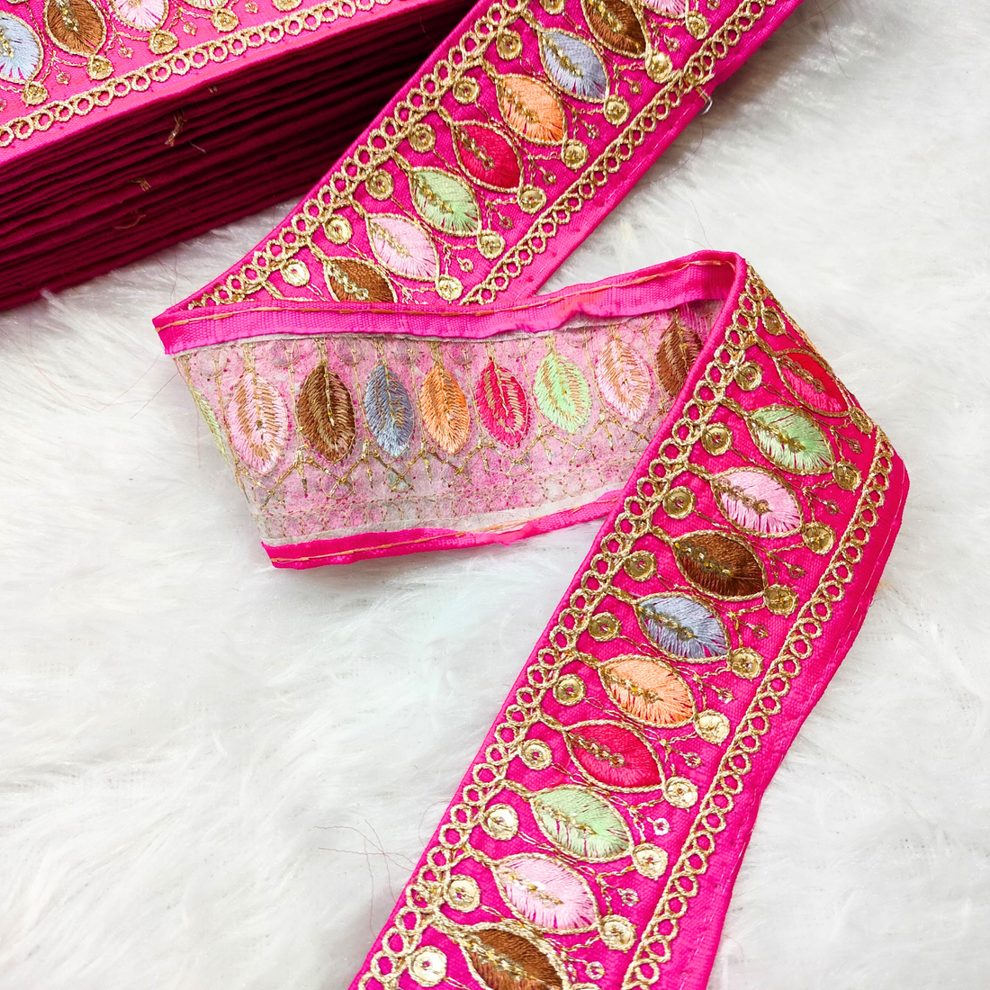 Elegant Pink Base with Colorful Thread Embellishments