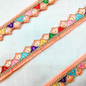 Elegant Peach Trim with Vibrant Multicolor Embroidery