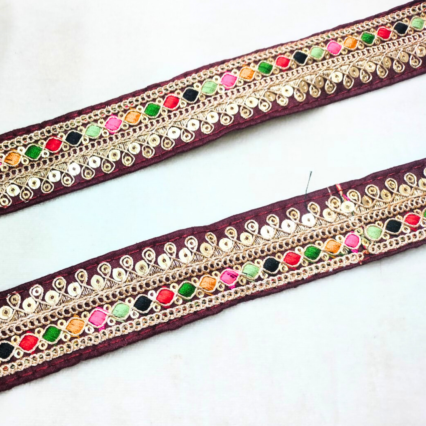 Elegant Maroon Base Multicolor Zari Trim