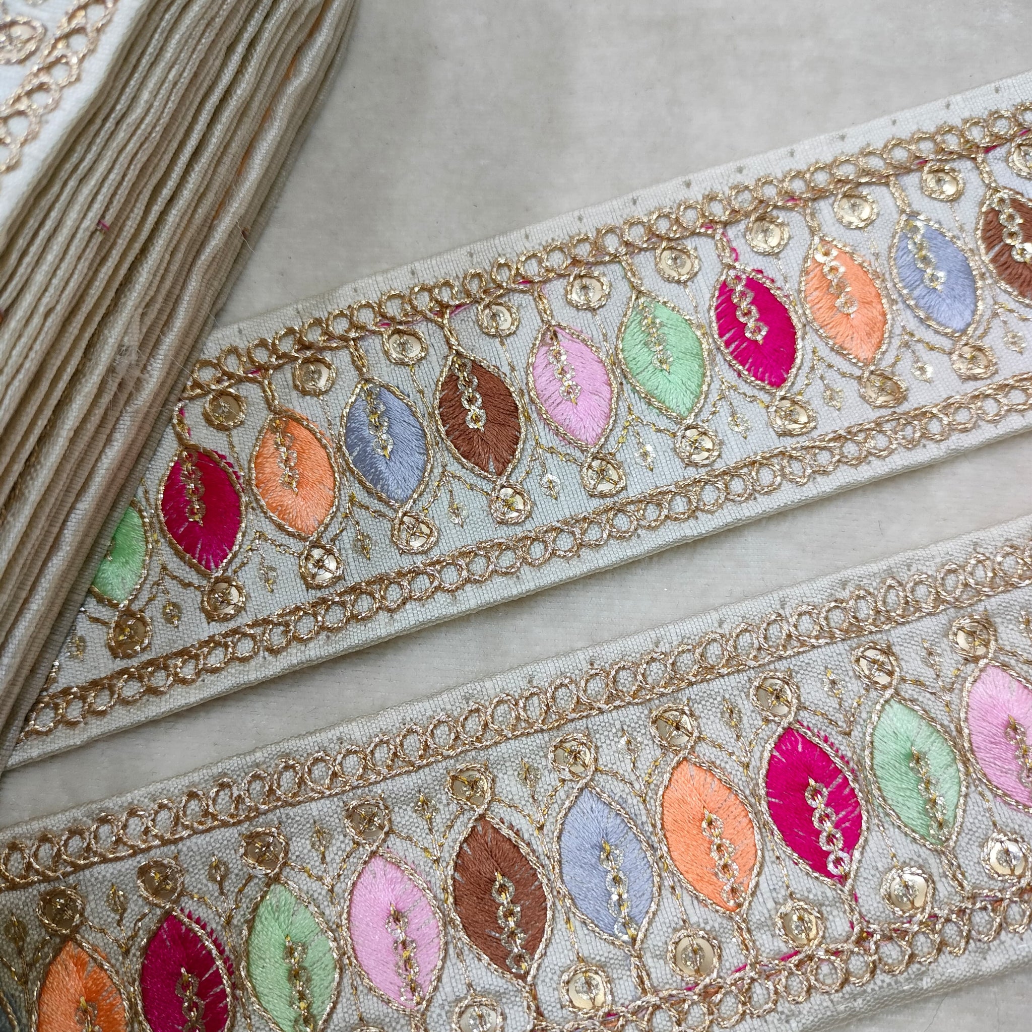 Elegant White Trim with Multicolor Embroidery