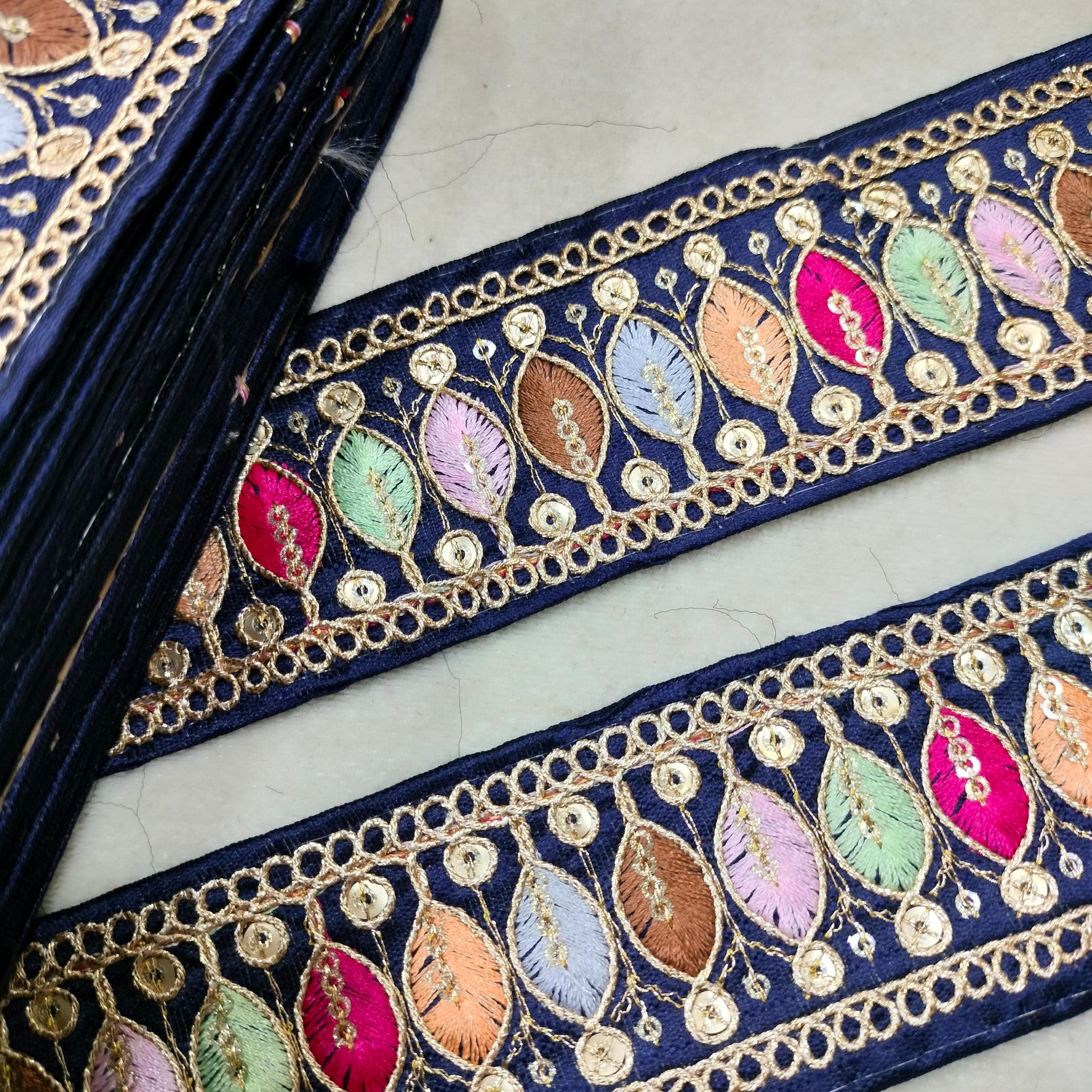 Elegant Royal Blue Trim with Vibrant Multicolor Embroidery